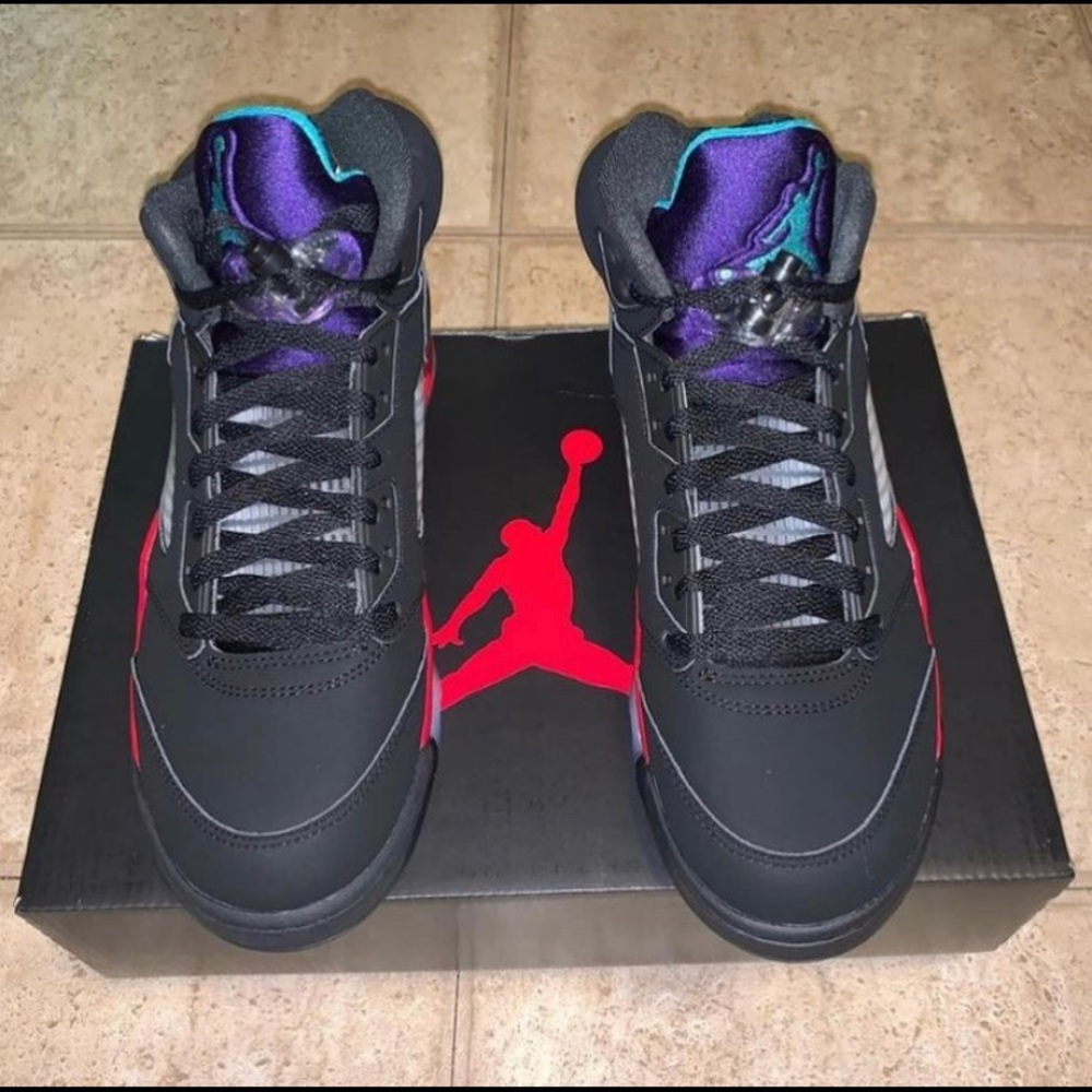 Black and purple Jordan 5s